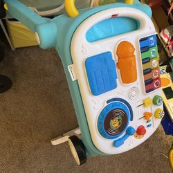 Musical mix n roll 4n1 Push Walker Activity center toddler table and Floor Toy