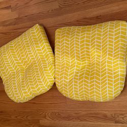 2 chair pillows yellow and white