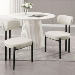 2 Brand new modern dining chairs - faux leather - white black