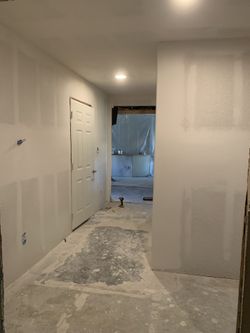 Sheetrock, Tape And Float.