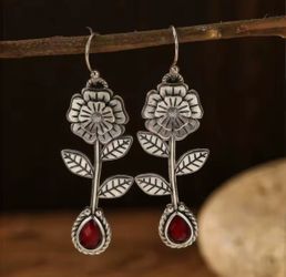 Beautiful flower design earrings with red stone