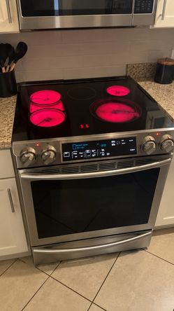 Samsung 30-in Glass Top 5 Elements Self-cleaning Convection Oven Slide-in Double Oven Electric Range (Stainless Steel) Price Including Delivery