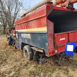 60 ft boom truck w/ dump chip box, 6 cyl
chipper, stump grind w/enclosed trailer