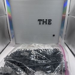 Silver and White Letter Board With Assorted White Letters and Words