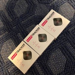 T-Mobile SyncUP Tracker 2nd Gen devices, used for real-time GPS location tracking.
