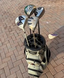 Bag Boy Golf Bag and Four Drivers