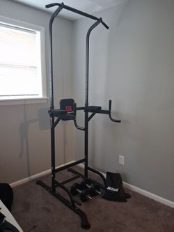 Power tower, two 40 lb Adjustable dumbells and resistance band set.
