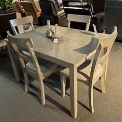 Table And 4 Chairs 