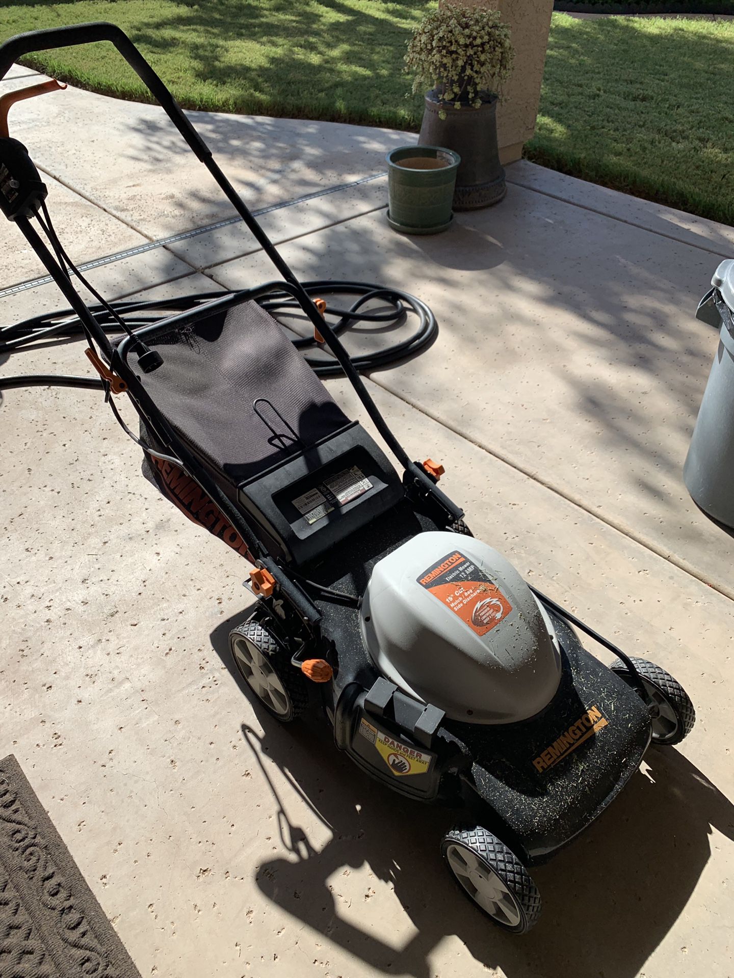 Electric lawn mower and weed eater