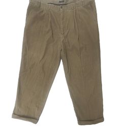 Vintage Men 50x30 Izod Corduroy Pants. 100% Cotton. Plain Light Brown/Tan color. Machine Washable. Pleated. Belt loops. 2 front pockets. 2 rear button