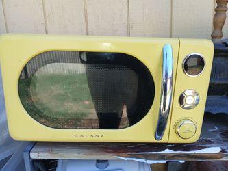 Microwave 25$ works Like New