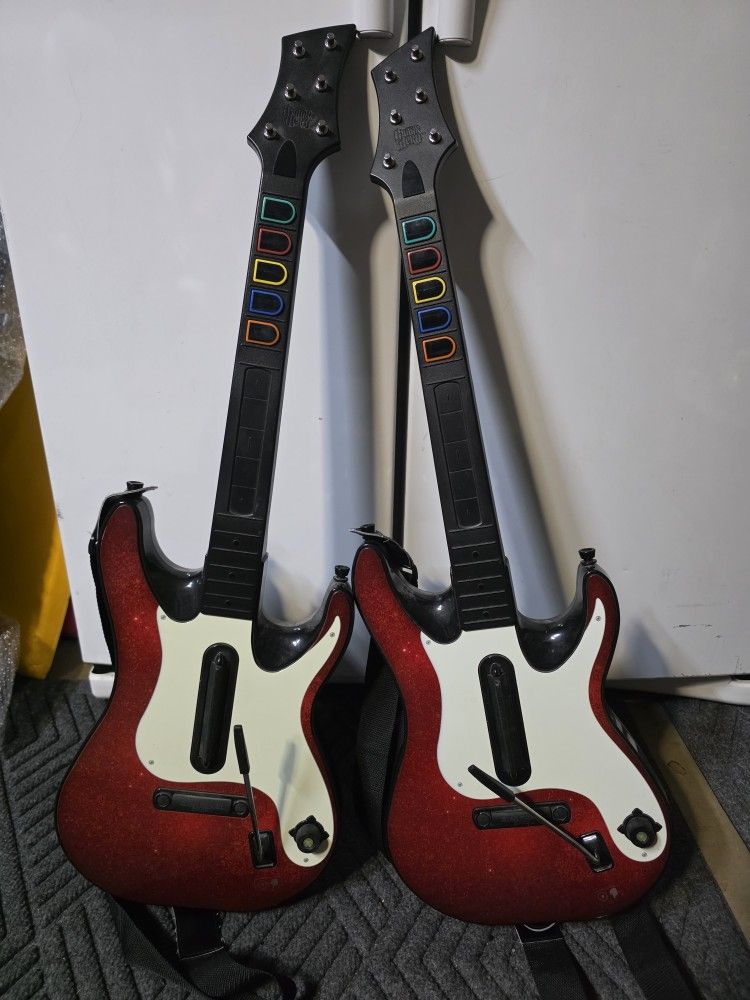 Two Wireless Guitar Hero / Band Hero Guitars for the Xbox 360 Console 