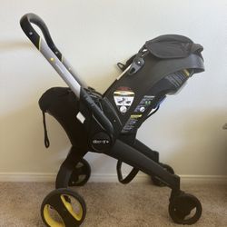 Doona Car Seat Stroller With  Base and Newborn Insert 