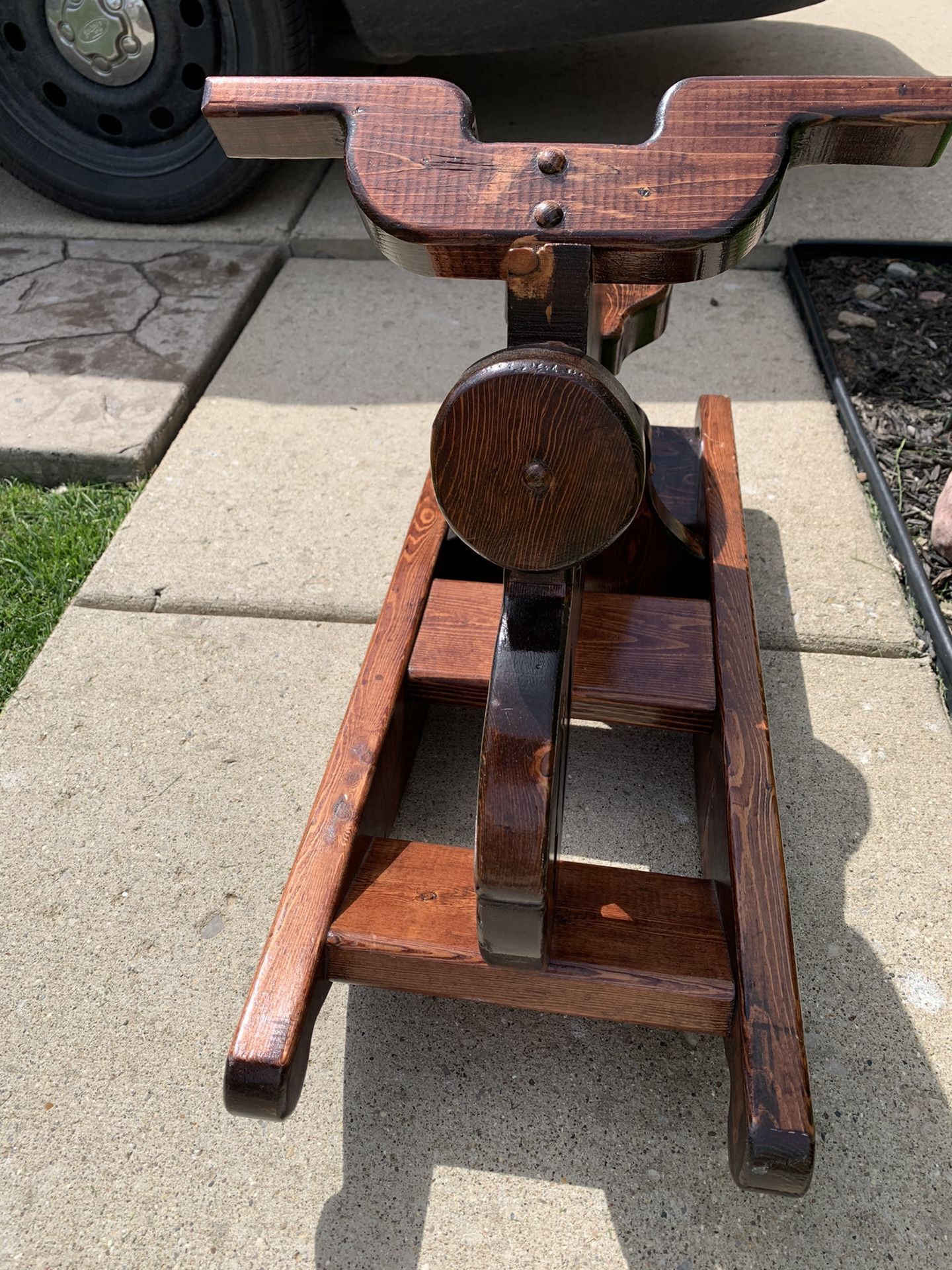 Custom made motorcycle rocker. Wood is heavy. Beautiful piece.