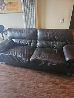 Slightly used brown leather  furniture