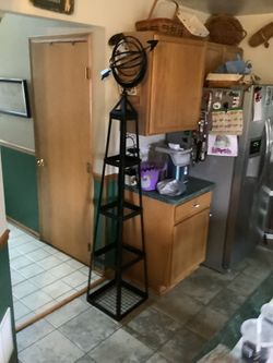 Wrought iron vintage Armillary with multiple shelves for display. Never been used outside, has brushed distressed design with removable shelves. This 