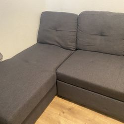 Grey Couch  Bed And Storage 