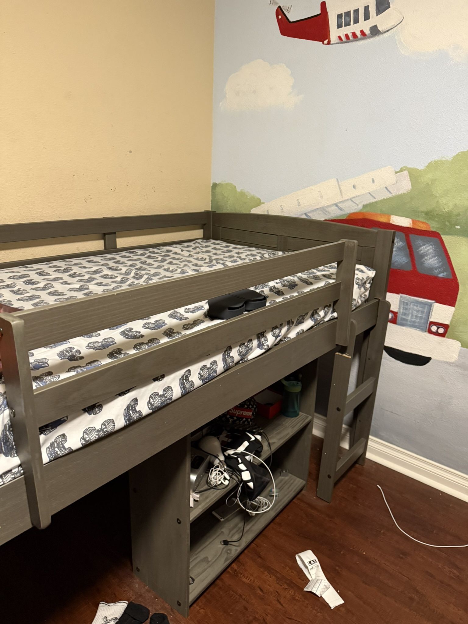 Gray Twin Loft Bed With A 3 Shelf Cabinet