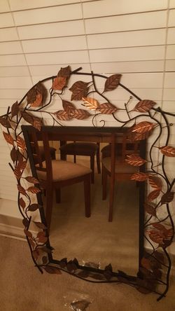 Mirror with metal frame