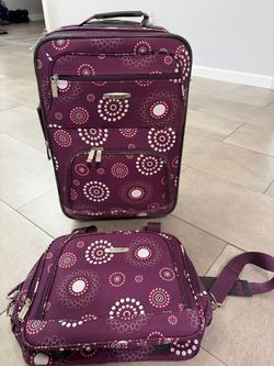 Purple luggage set. Carry on size