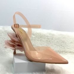Brand new women's nude pointed-toe heels in size 7