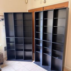 Two CD/DVD/Book Shelves 