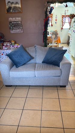 Sofa and love seat w pillows