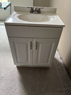 White Bathroom Vanity with Sink and Faucet