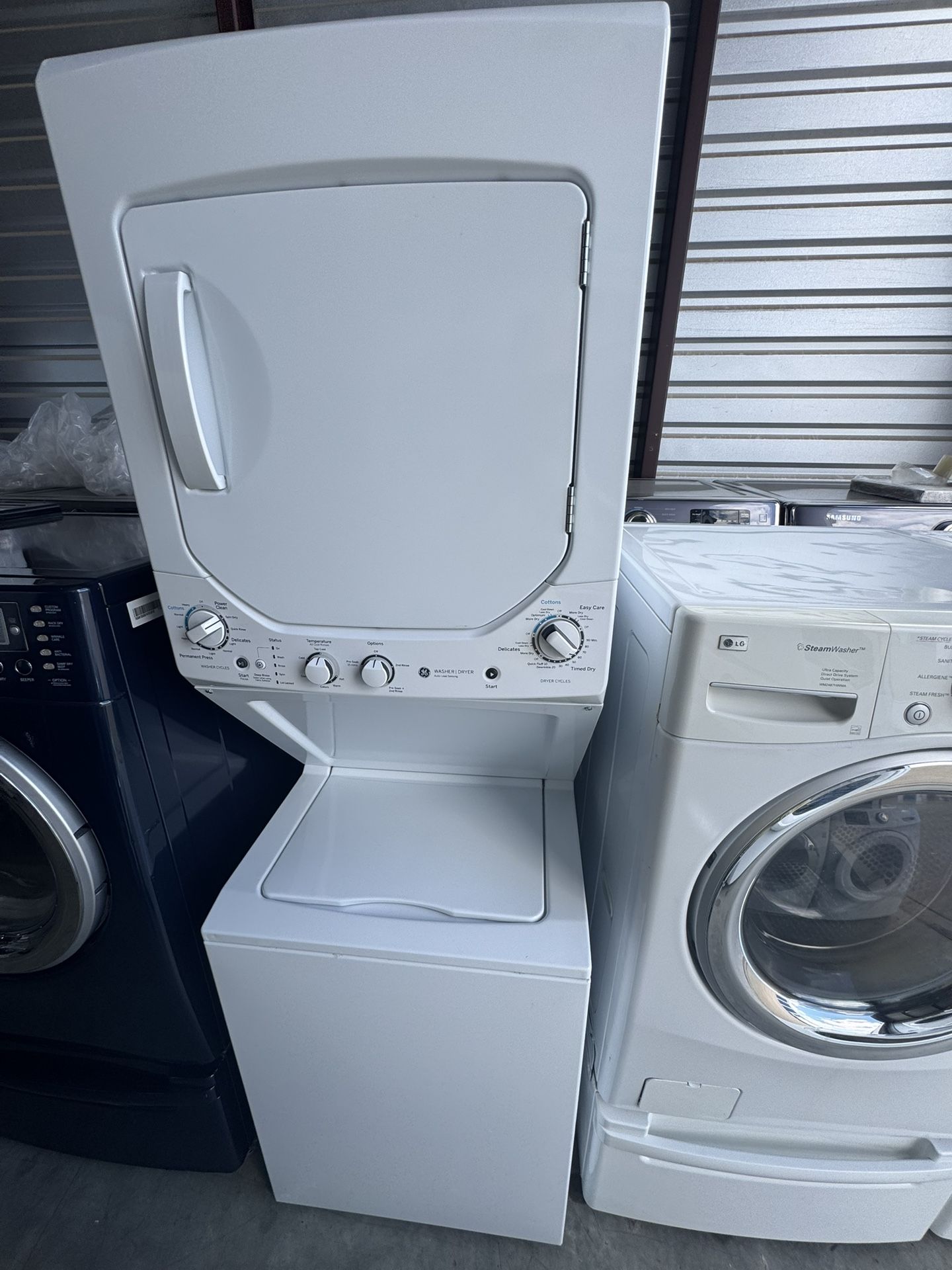 Ge Stackable Washer And Dryer Electric 24" dimensions 74" height 24" depth 28" working perfectly extra for delivery same day delivery and install