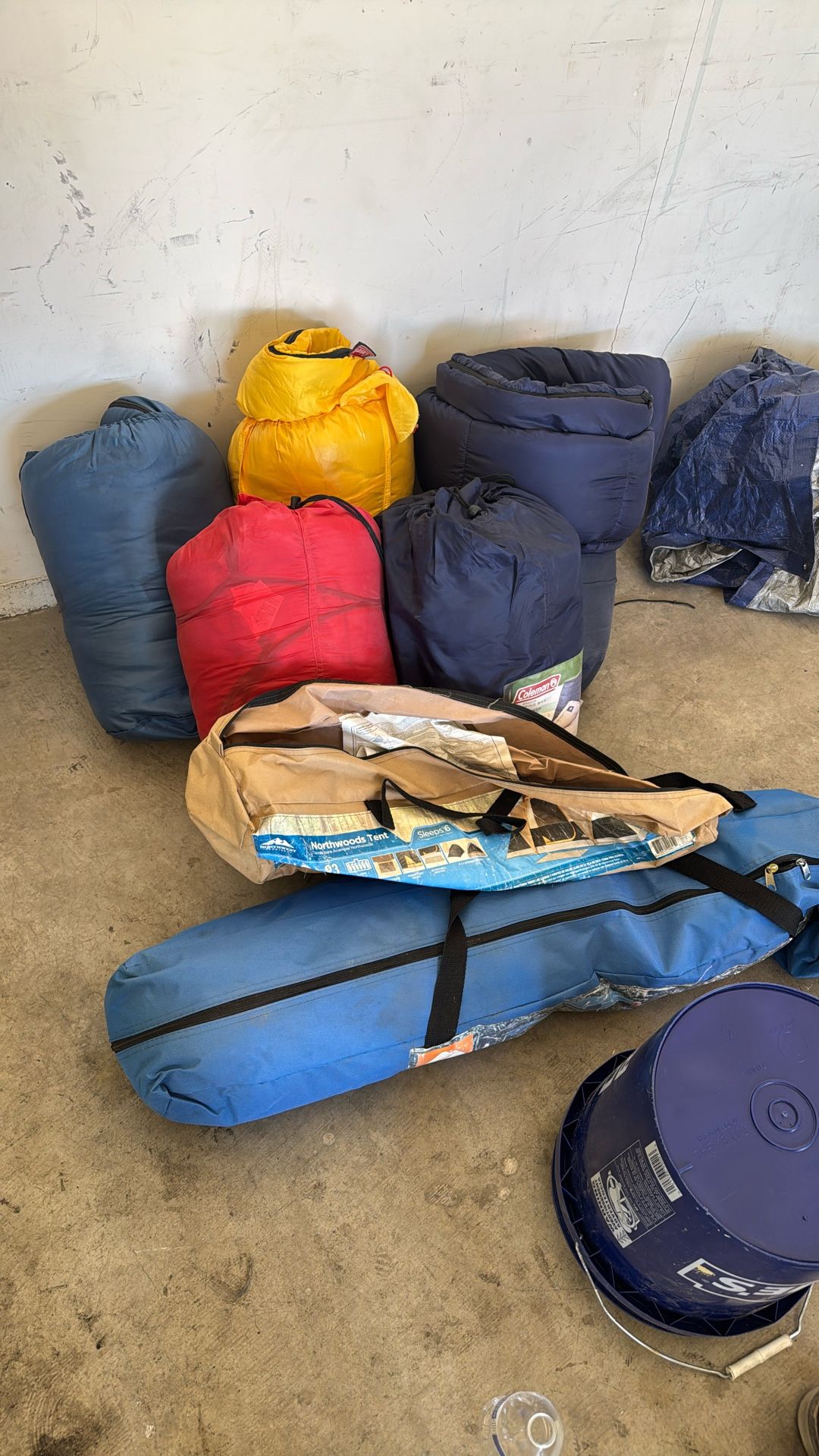 5 Sleeping Bags And A Tent