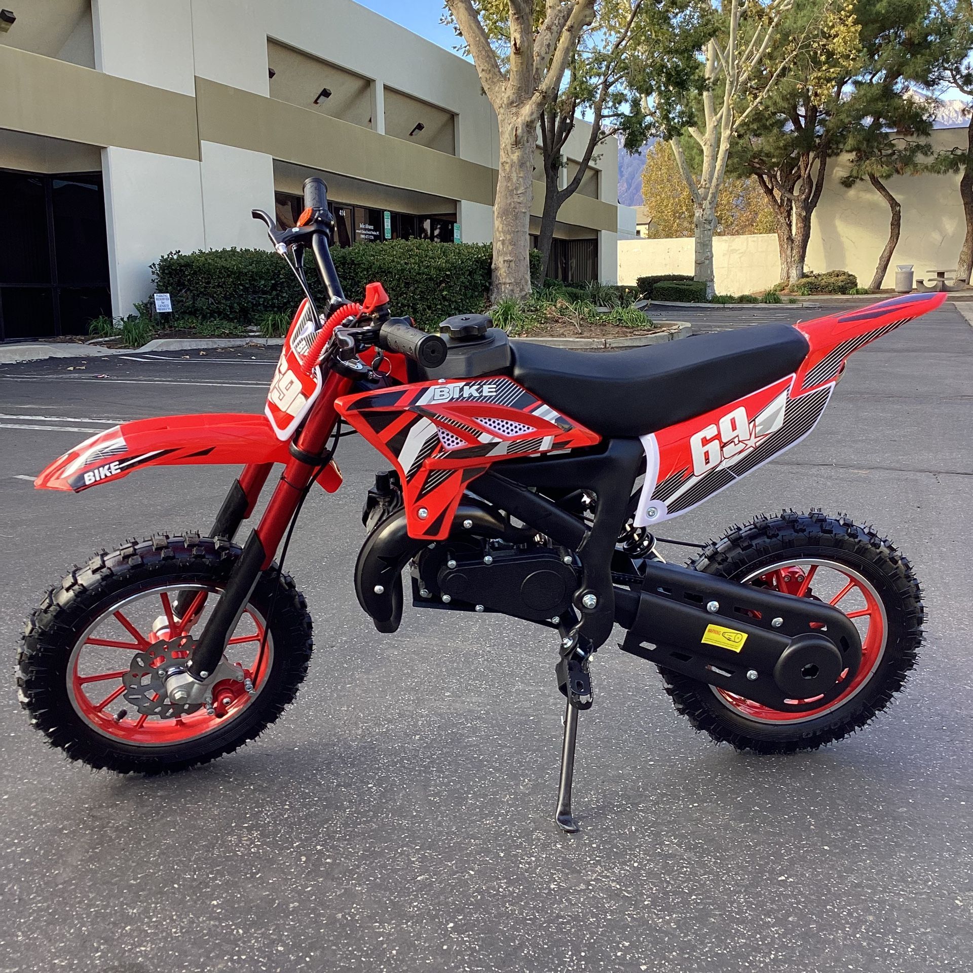49CC Kids Dirt Bike 2-Stroke ,Speed Up to 20mph,Max Load 135Lbs Red