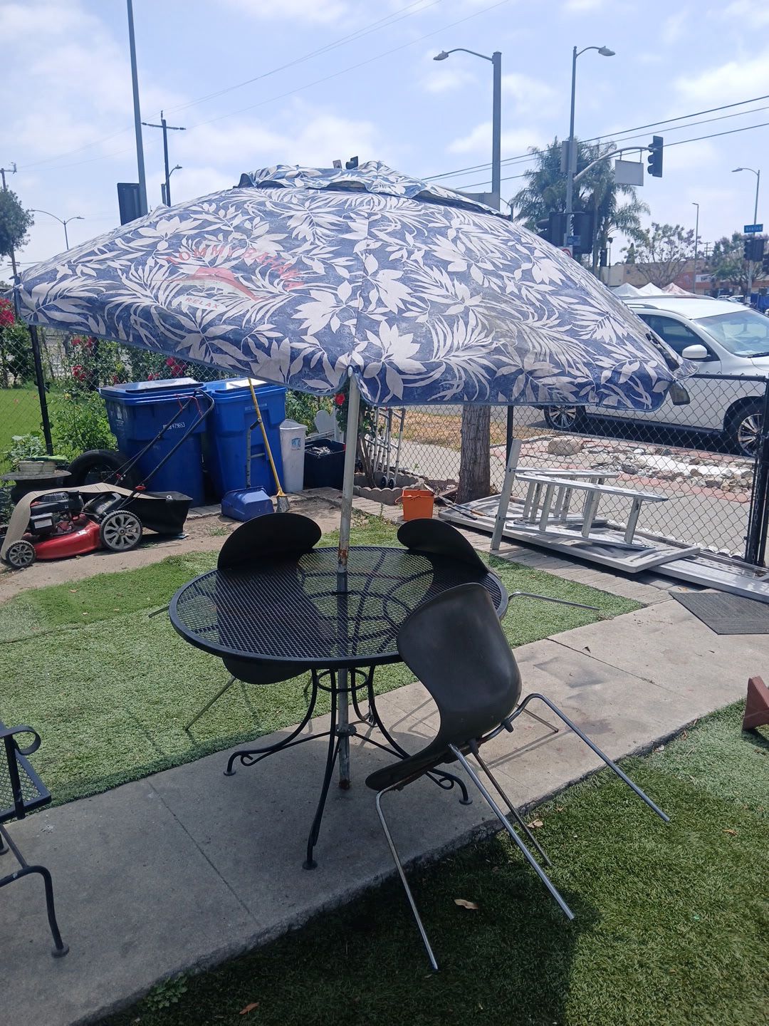 Metal Table With Umbrella And Chairs
