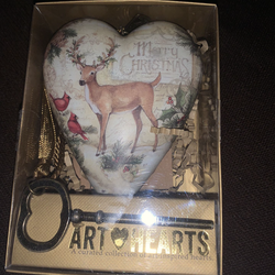 Christmas DEMDACO "Art Hearts" resin stone heart keepsake featuring the artwork of Susan Winget.