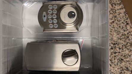 Defiant electronic keypad deadbolt and door knob handle set