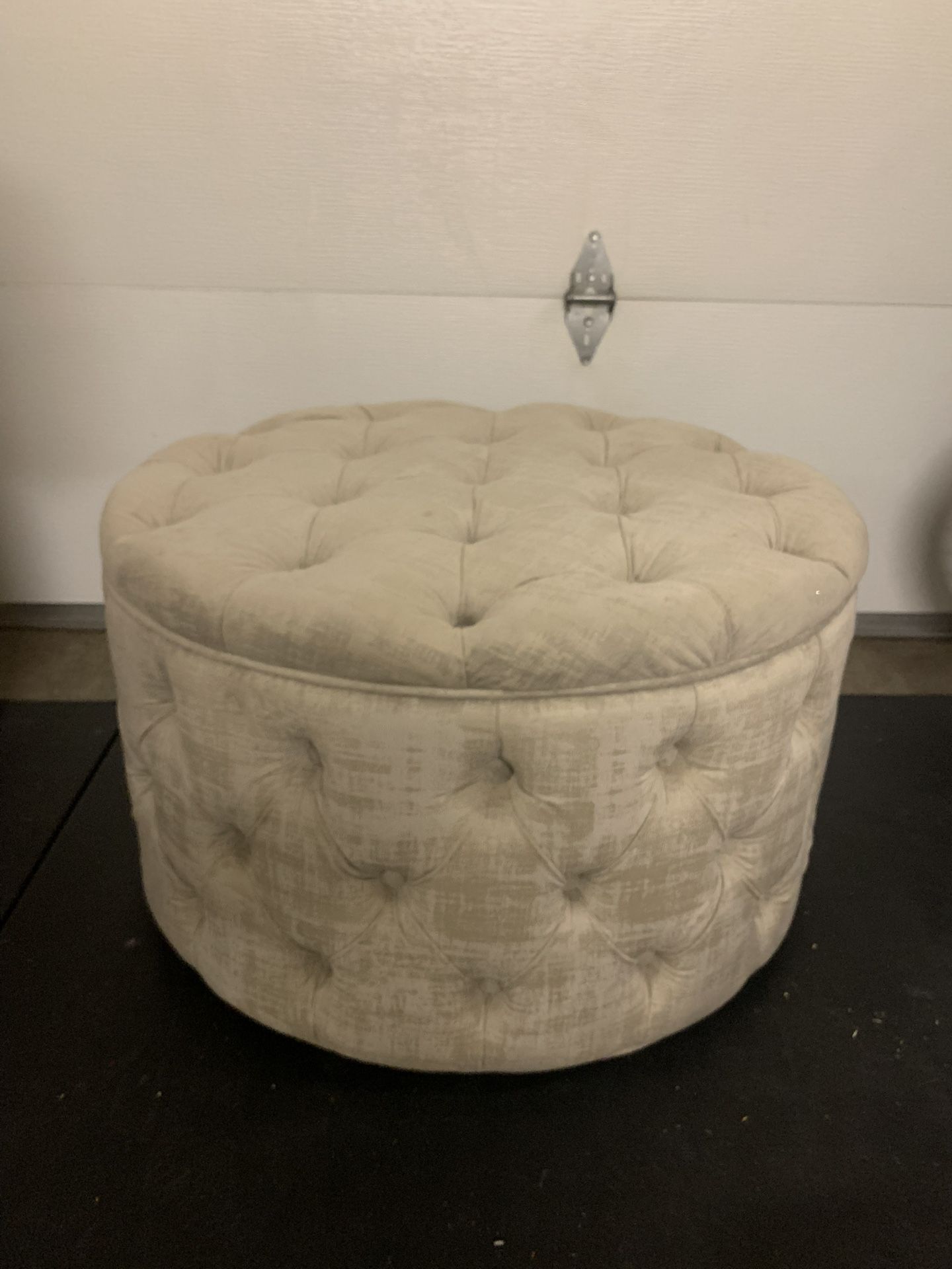 Grey tufted ottoman