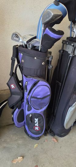 Assorted golf clubs