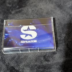 SiriusXM-branded novelty cassette-style Bluetooth speaker and charger