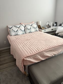 Full bed mattress with frame  Also includes box spring  Comes with comforter set (pillows not included)