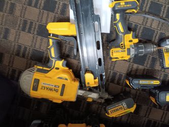 Dewalt Cordless Nailer  And A Dewalt Blower And A Chsrger And 4 Batteries 
