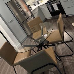 Glass Table & 4 chairs ASHLEY Furniture 