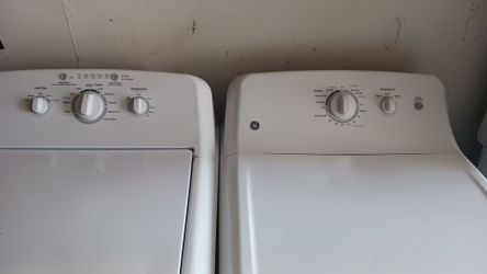 GENERAL ELECTRIC TOP LOAD WASHER AND ELECTRIC DRYER.