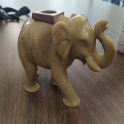 Elephant 4x4" decor candle holder

Great shape. Normal wear. Heavy! Vintage.