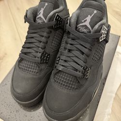 Jordan 4 Black Cat Size 7 men, size 8.5 women