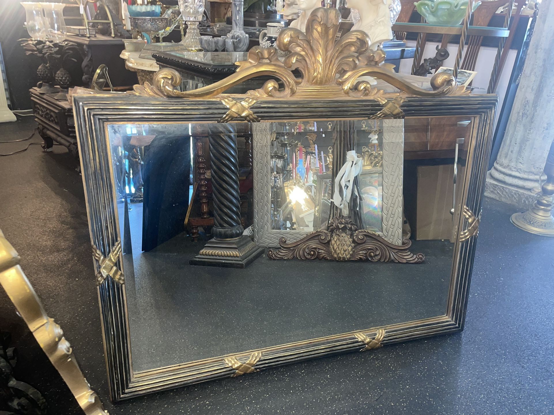 Beautiful gold and black Bombay ornate beveled mirror