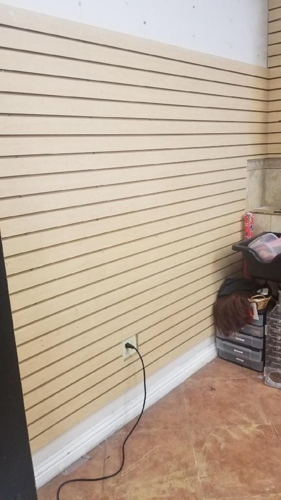 Slat wall, slightly used. This photo obtains 2 separate slay walls. for Sale in Buena Park, CA