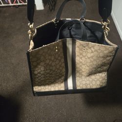 Coach bag  my wife wore it  3 times  brand new