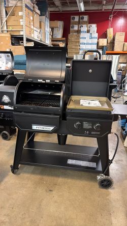 Pit boss DX black propane and wood pellet combo grill
