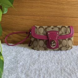 COACH Wristlet with clasp (MARKED DOWN FROM $90)
