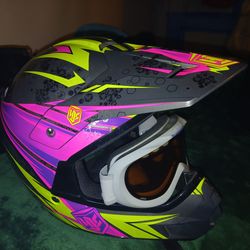 Females Helmet  Large  green and pink with riding goggles .