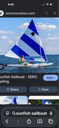 2 sunfish sailboats
